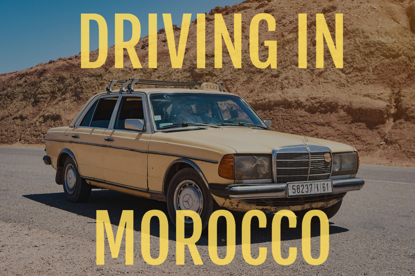 yellow car with driving morocco text for a blog post about is driving in morocco safe