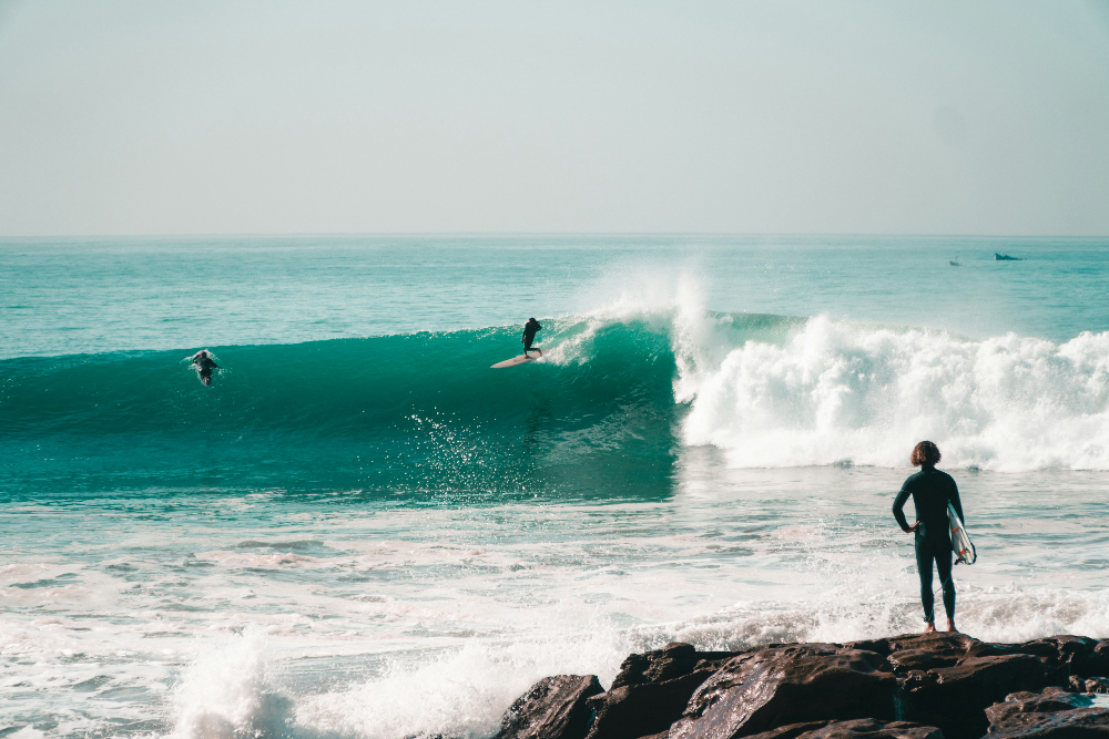 Surfers in taghazout beach in morocco