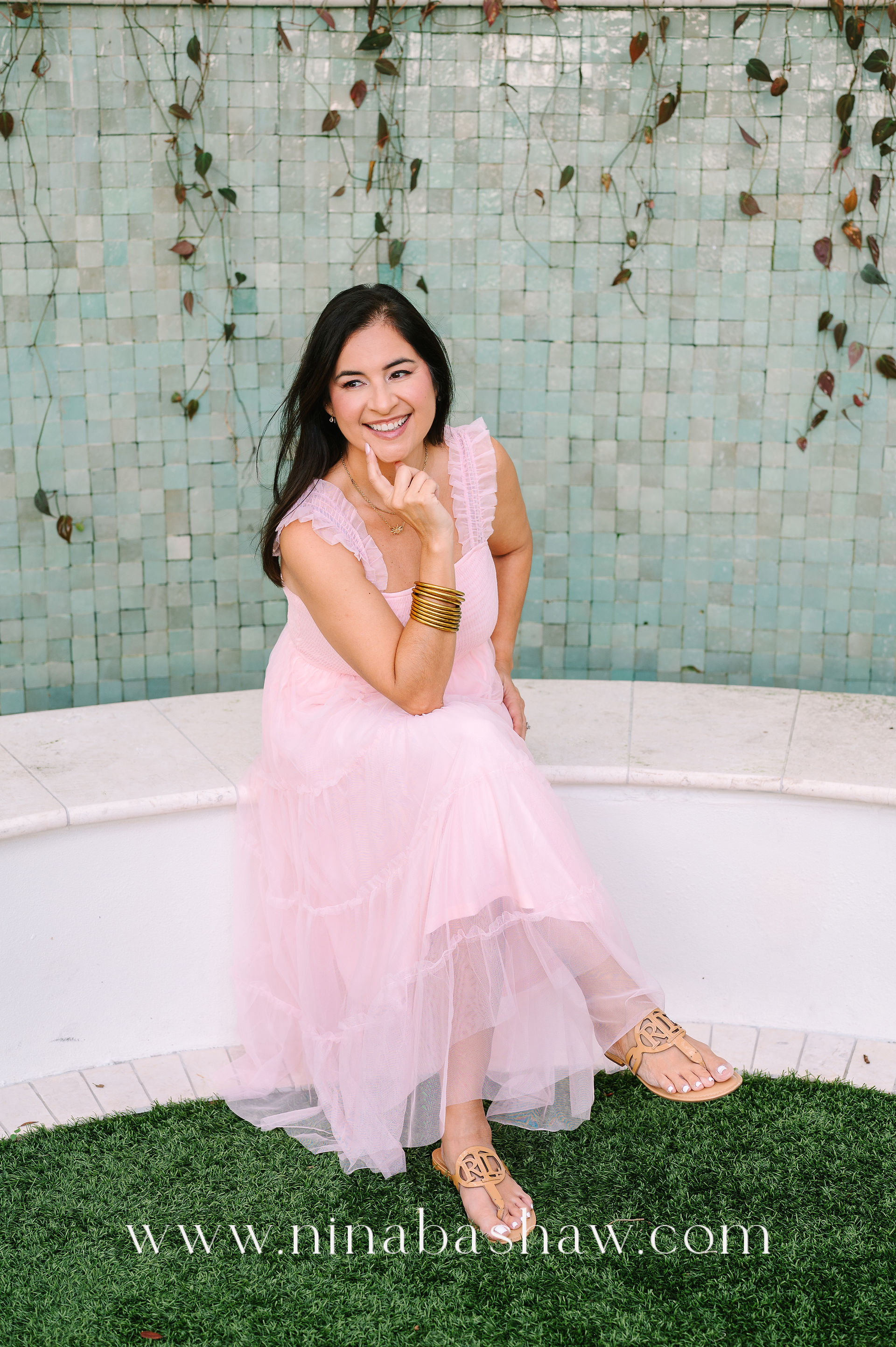 A professional headshot of Betty from Shimmer and Delights captured to highlight her personality and brand style by Tampa food and branding photographer Nina Bashaw.