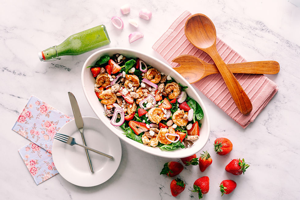 Strawberry Shrimp Salad with Honey Basil Vinaigrette Salad with fresh strawberry shrimp salad topped with La Bonne Vie goat cheese crumbles, candied pecans, leafy greens, and homemade basil vinaigrette photographed in natural light by a Tampa food photographer.