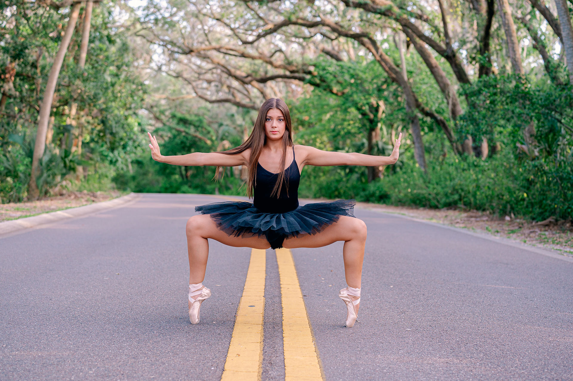 Outdoor ballet senior portrait session taken at Philippe Park by Tampa senior portrait photographer