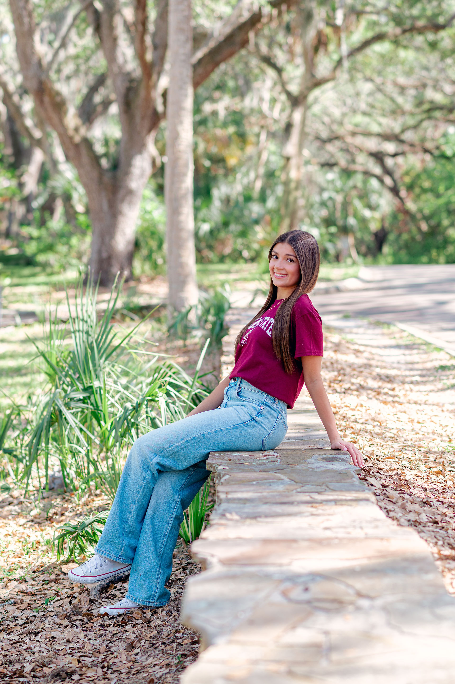 Senior portraits taken at Philippe Park by Tampa senior portrait photographer Nina Bashaw