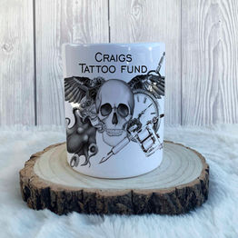 Men's Tattoo Money Box. These refillable ceramic tattoo gun men's money boxes are our best seller! With a unique illustration only available here. they can hold roughly 200 pound coins and lots more paper money to get those funds building!