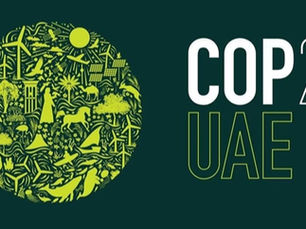 COP28 UAE climate summit banner showing world leaders and negotiators gathered in Dubai in December 2023 to finalize the historic UAE Consensus on global net zero transition.