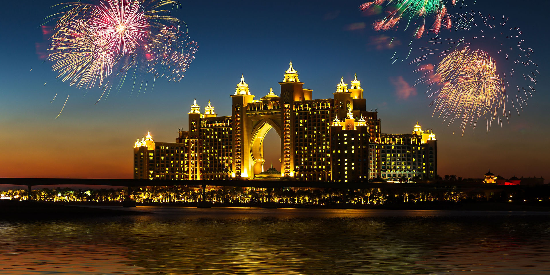 A hotel in Dubai with fireworks in sky