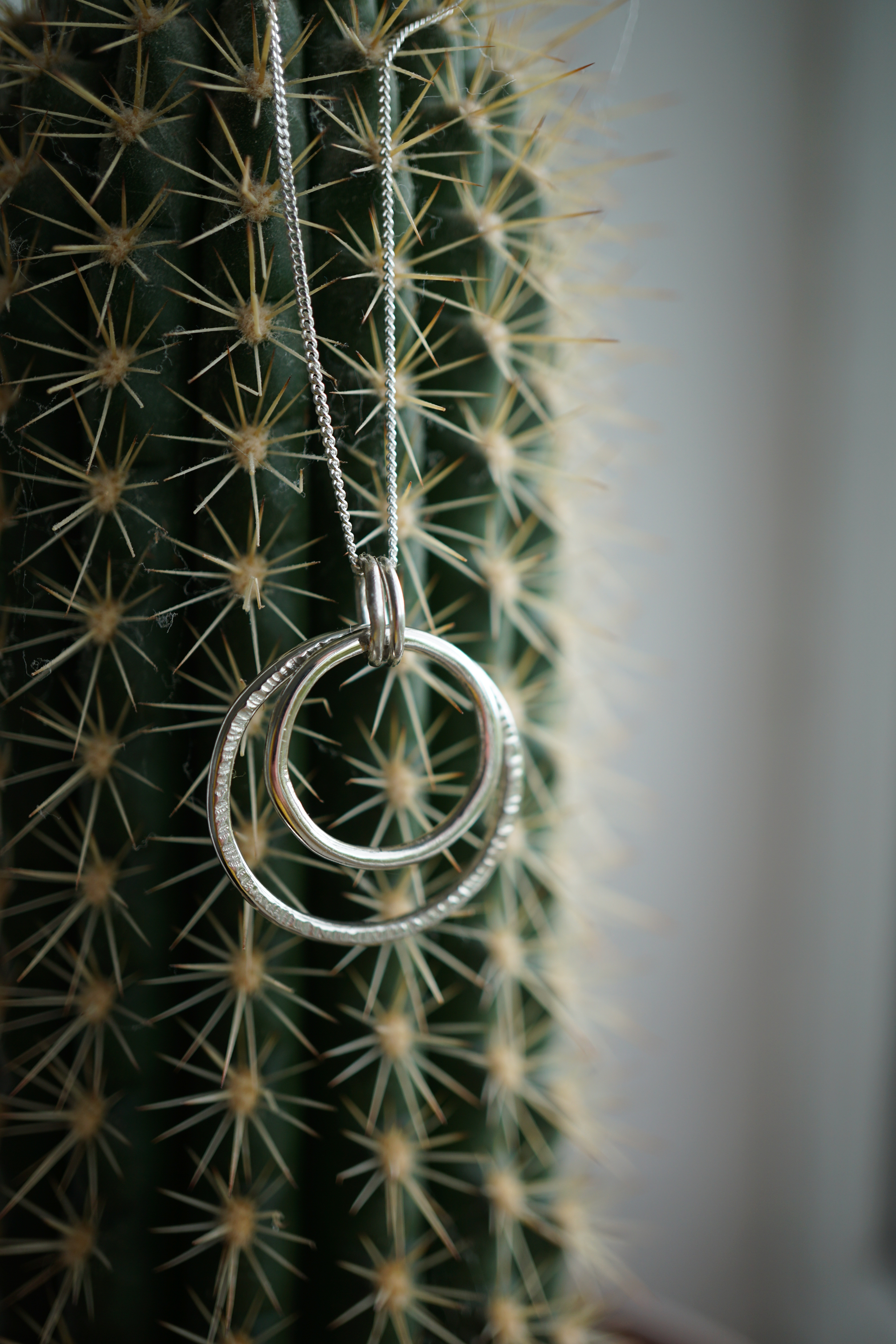 Two Hammered Silver Rings Pendant
