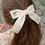 Thumbnail: Velvet Bow Hair Clip, Pearled Ivory - Konges Sløjd