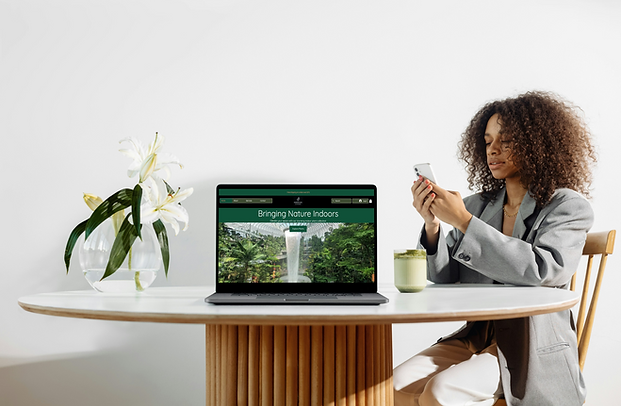 Fernscape Interiors on a laptop.png