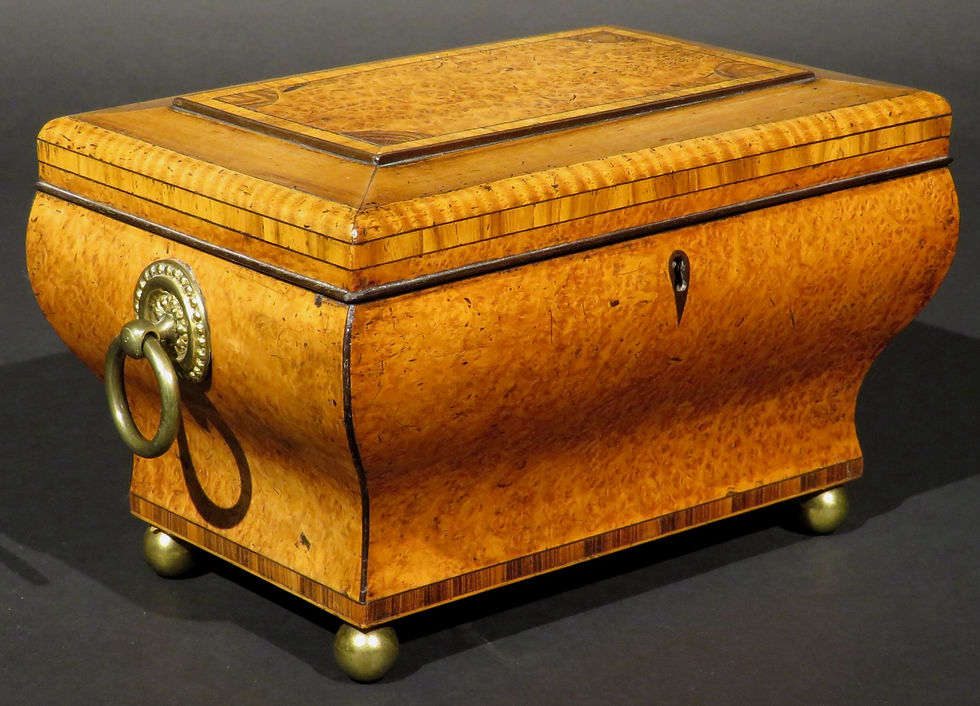 Thumbnail: A Very Fine Biedermeier Period Tea Caddy in Exotic Woods and of Bombe Form