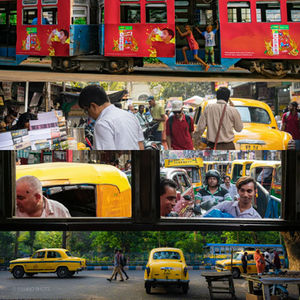 "Commuters of Kolkata"

It's always been a very busy crowded City of India with a large number of people commuting by walking, by the iconic yellow taxis, Old Trams and buses instead of personal vehicles. What made me fall in love with this city are the colors I have observed everyday! Though it's a City with higher humidity and I was sweating out so much during the exploration but the colors of everyday life in here and diversity kept me entertained!
Thanks to the multi-talented Shalini
,who kept her promise to show me some beautiful parts of this City!