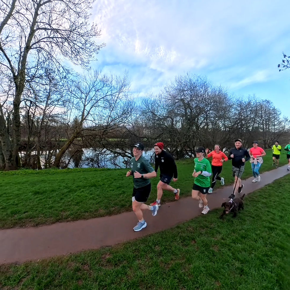 A.R.S.E Run Club members running beside the river
