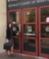 Debt collection attorney entering Maryland Courthouse