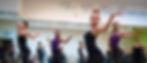 Teenage dancers performing in unison