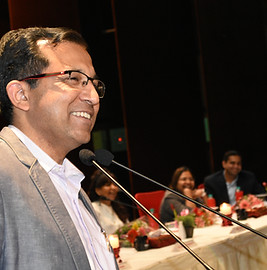 Speaking at a College Graduation Event.