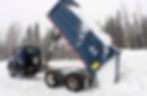 Dump truck dumping snow
