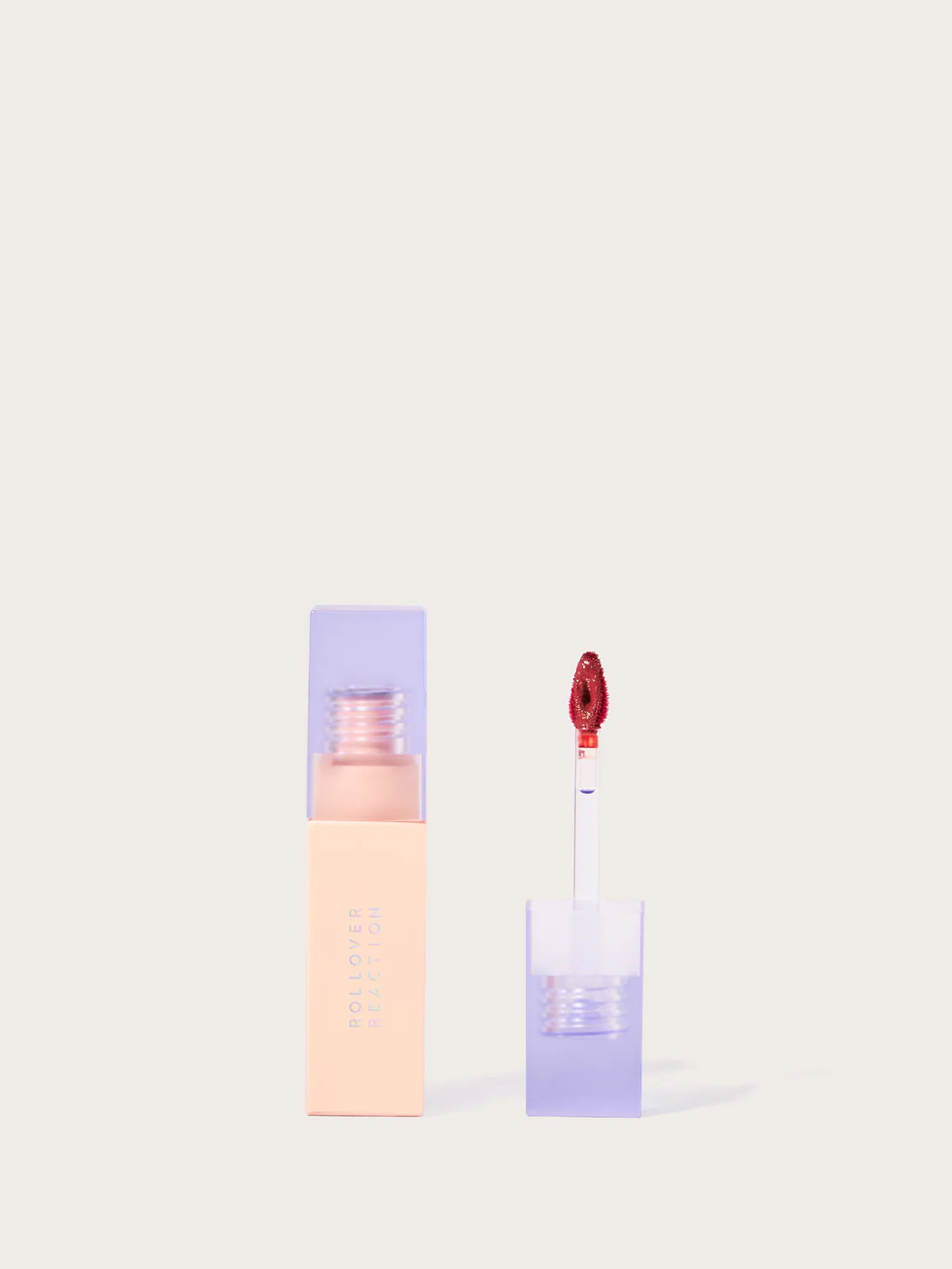 Rollover Reaction liquid blush with a doe-foot applicator in a rosy shade, featured in the guide to 