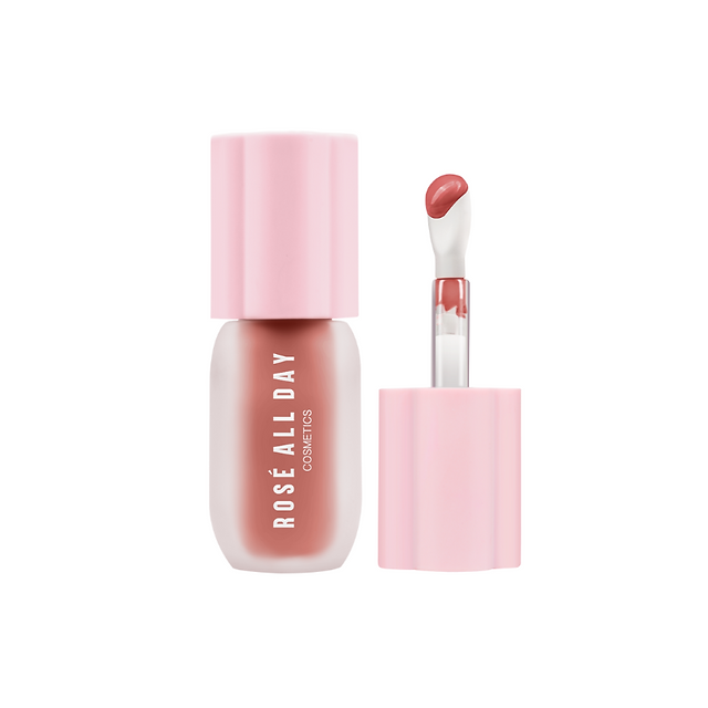 Rose All Day liquid blush in a soft rosy shade with an applicator wand, featured in the guide to 10