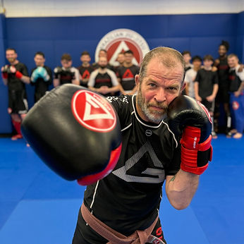 dr greg as brown belt mma instructor.JPEG