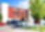 Artspace Norbridge Court commercial space exterior with parking lot and mature trees