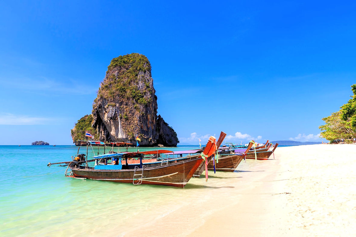 long-tail-boat-turquoise-crystal-clear-sea-water-with-limestone-cliff-mountain-phra-nang-b