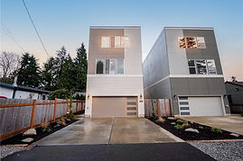 Modern townhouse with garage on the bottom; color blocking cream and tan 