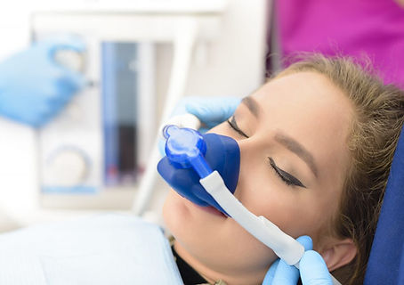 woman with nitrous oxide mask
