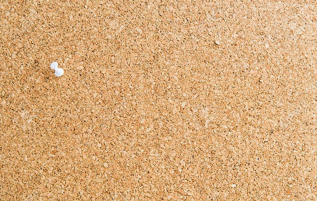 42501279-cork-board-with-a-single-white-