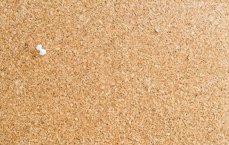 42501279-cork-board-with-a-single-white-