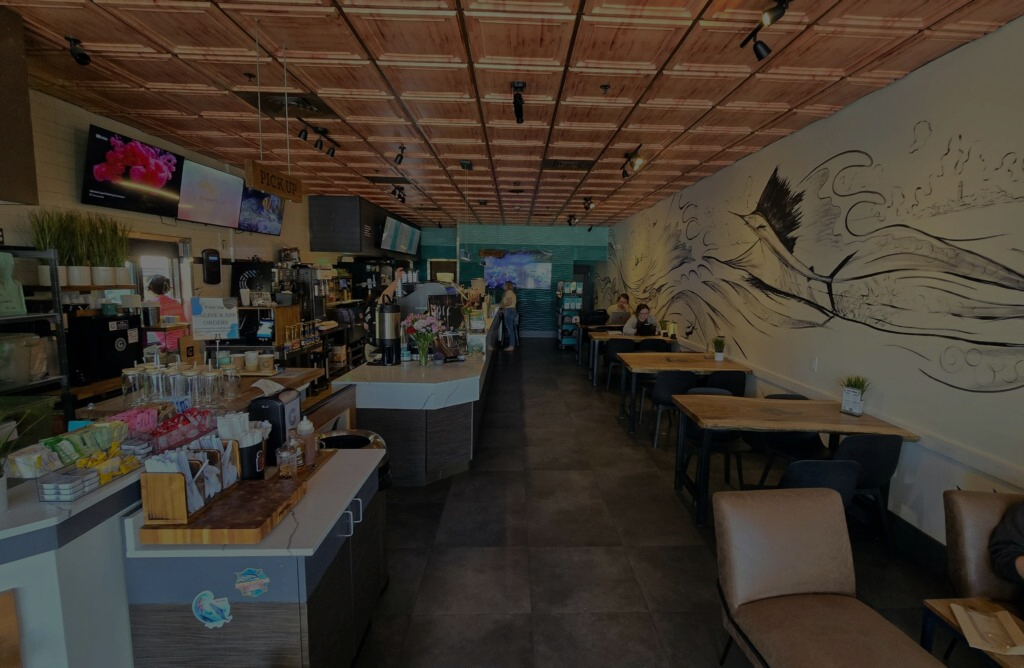 The counter and seating inside The Googan Coffee Shop on Federal Highway