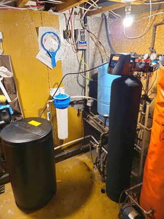 Adoucisseur eau et boîtier-filtre résidentiel