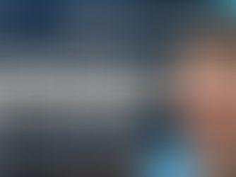 Man in glasses and a blue hoodie smiling; text reads: "Dillon Considine, Apprenticeship to Entrepreneurship, 13th July-3PM" against a tech-themed backdrop containing an office setup and a view to a city backdrop