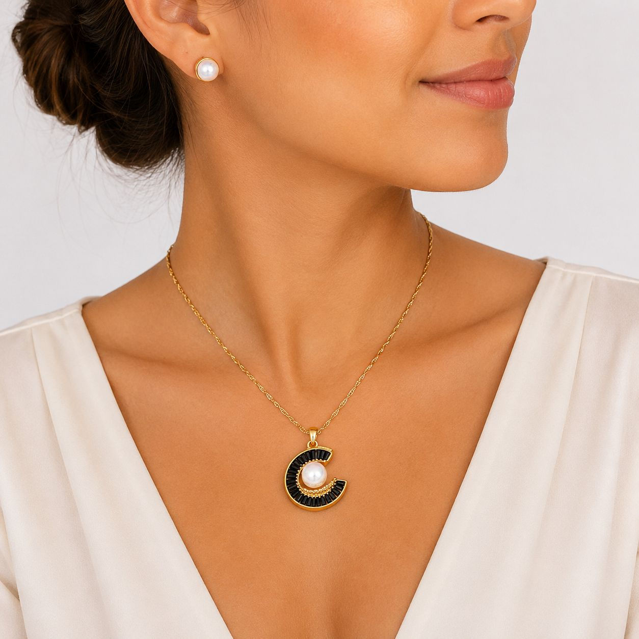 JUEGO ECLIPSE CADENA + ARETES PERLAS TORNASOL