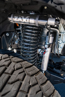 Carli E-Venture shock absorber installed on a custom lifted Ford F-350 suspension system