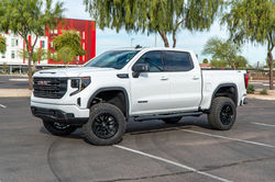 Angled view of a custom 2026 GMC Sierra Elevation showcasing its lifted stance, aftermarke