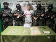 Capturan a alias "El Pollo" con drogas y arma de fuego en Comayagüela