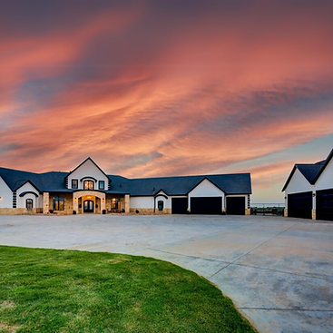 Stunning 5-bedroom, 5-bathroom luxury estate at 308 Palomino Drive, Lubbock, TX, overlooking Buffalo Springs Lake. Features include a gated entrance, heated pool, outdoor kitchen, spacious garage for 8 vehicles, and breathtaking lake views. Listed by Top Lubbock and West Texas Real Estate Agent, Lainie Eilenberger, Key & Slate Real Estate Group.