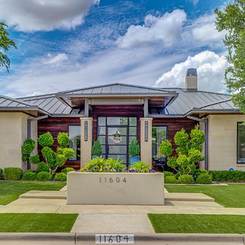 Exterior view of 11604 Uxbridge Avenue, a luxurious 4-bedroom, 3-bathroom home in Oakmont Estates, Lubbock, TX—featuring 3,571 sq ft, a massive chef’s kitchen with oversized island, a finished basement with surround sound, a covered patio with outdoor fireplace, and a backyard oasis with pool, slide, and hot tub. Listed by top Lubbock and West Texas Realtor Lainie Eilenberger of Key and Slate Real Estate Group at Keller Williams Realty.