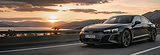 Schwarzer Audi bei Fahrzeugüberführung auf eigener Achse