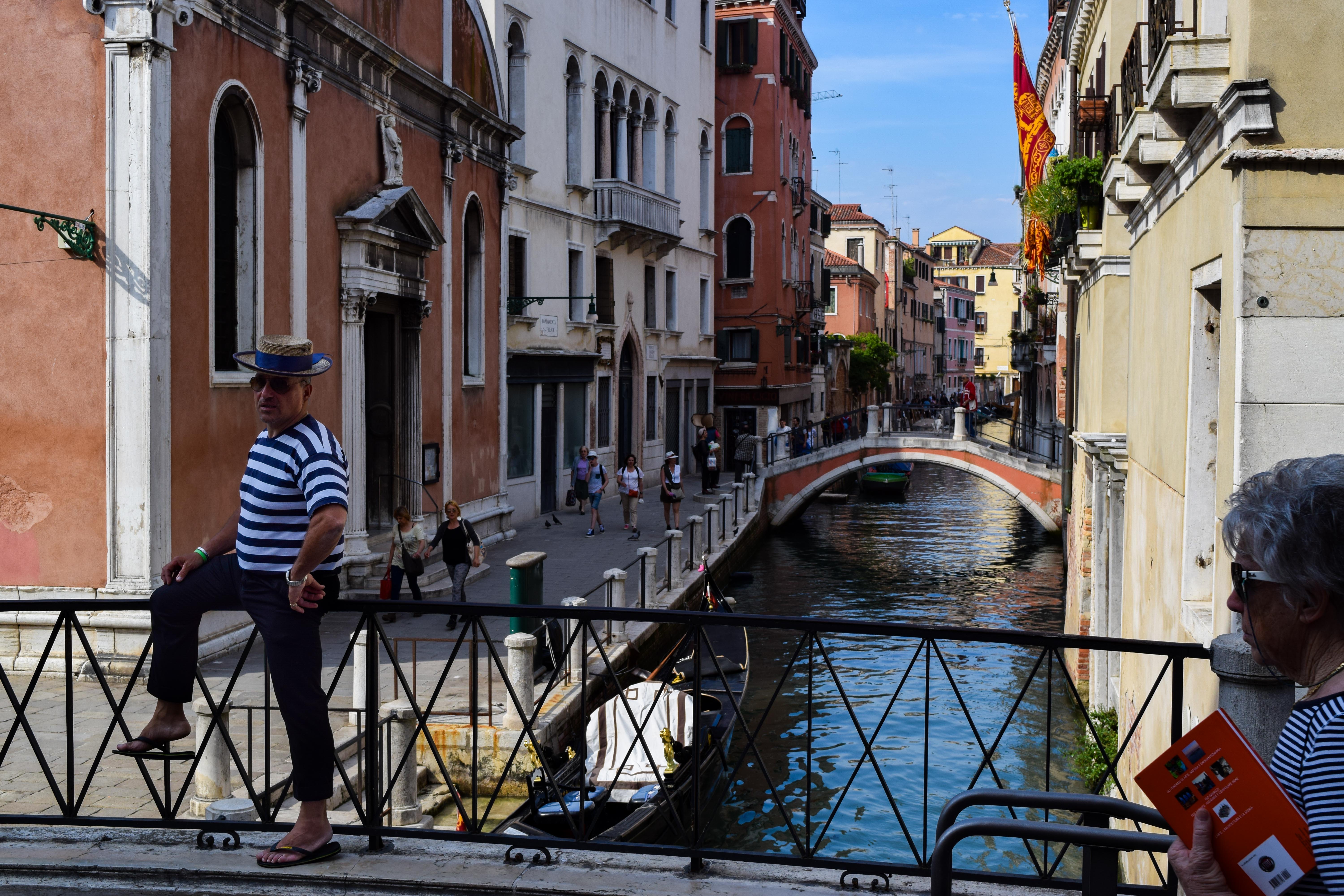 Man by canal · Venice