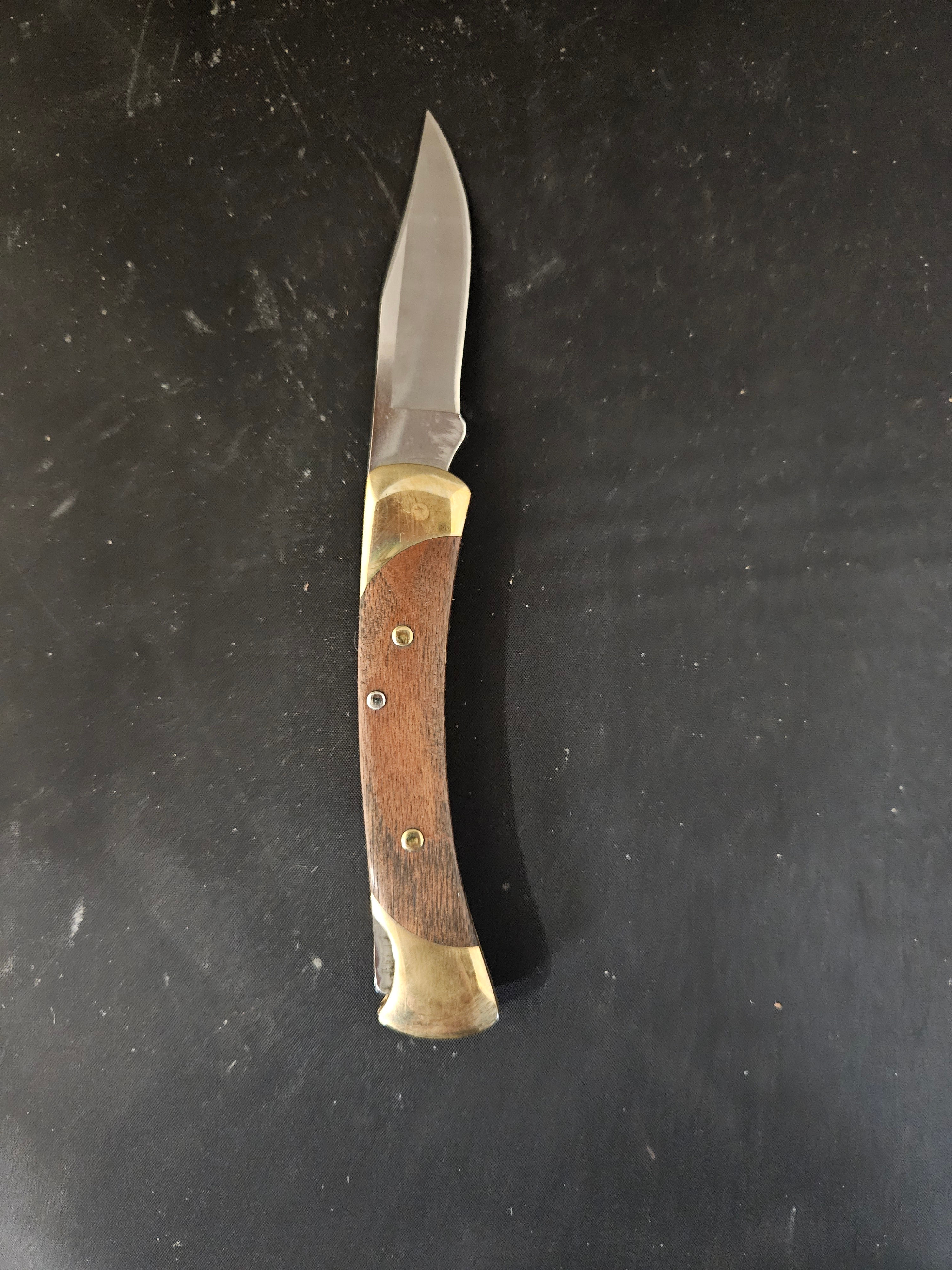 Buck 055 The 55 Folding Hunter 2.375" Plain Blade, American Ebony Wood Handles