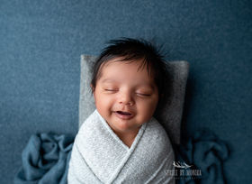 newborn photography NJ photographer baby smiling newborn family photographer in New Jersey 