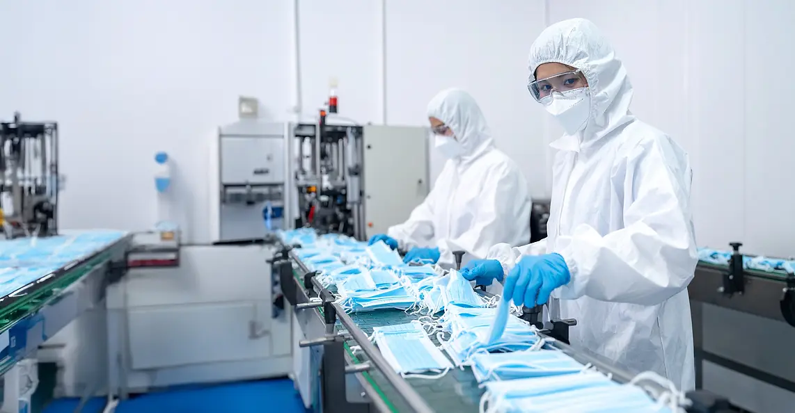 Uhealth_Factory-workers-are-producing-Personal-Protective-Equipment-PPE.webp