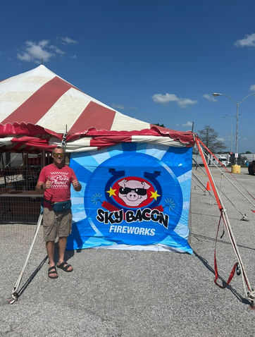 Iron Eagle Fireworks in Kingdom City and Fulton, MO - Shawn with Sky Bacon Fireworks banner