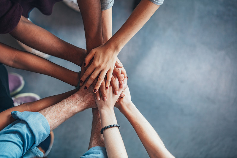 Stack-of-hands-showing-unity-625736338_6