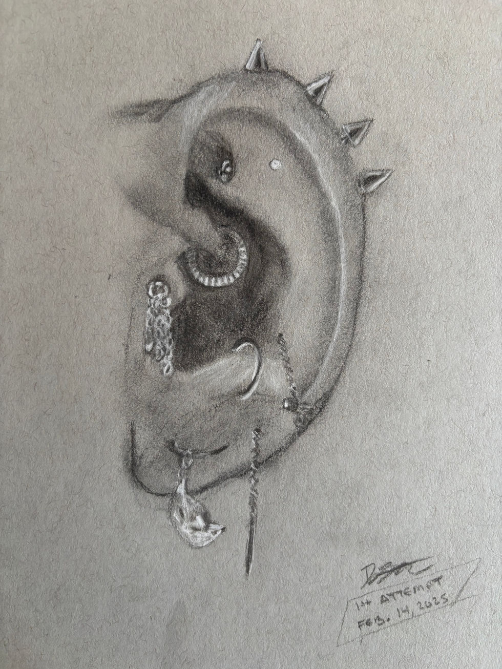 Charcoal drawing of a left ear with a note that this was the first attempt