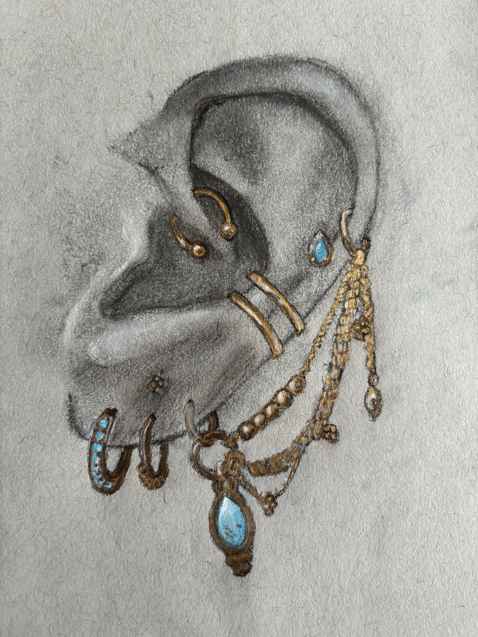 Charcoal drawing of a right ear with gold and turquoise soft pastel accents.