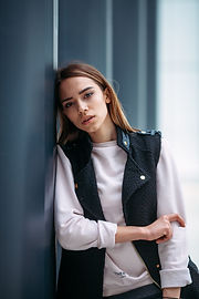 Woman Leaning Wall