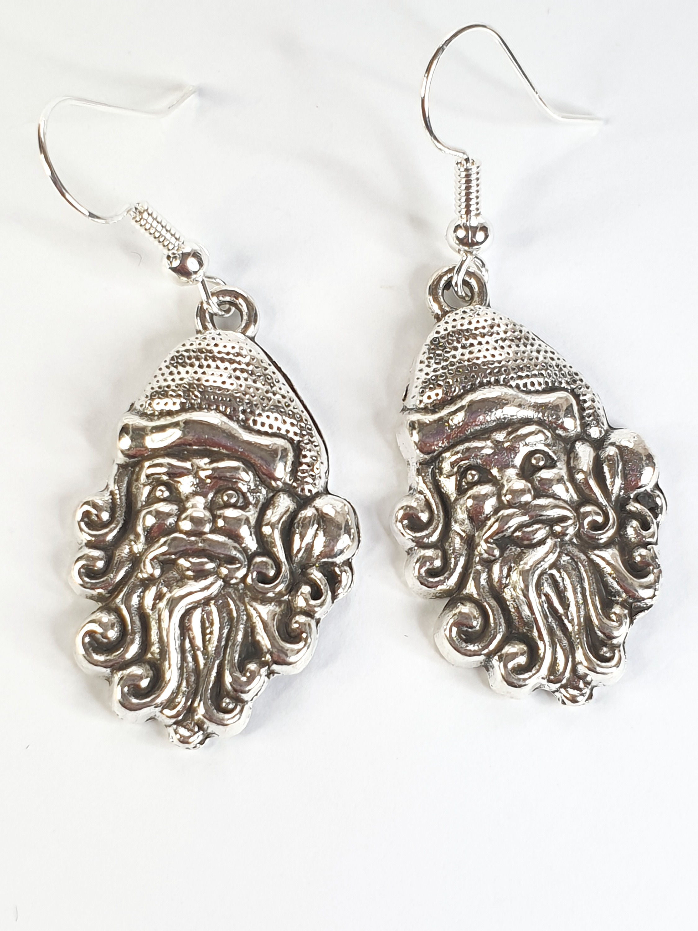 Pair of santa head earrings