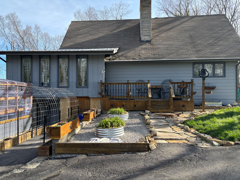 Front view of home before exterior painting project in Upper Cumberland, TN.