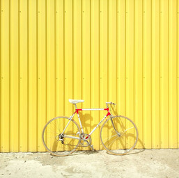 Bike Against a Yellow Wall